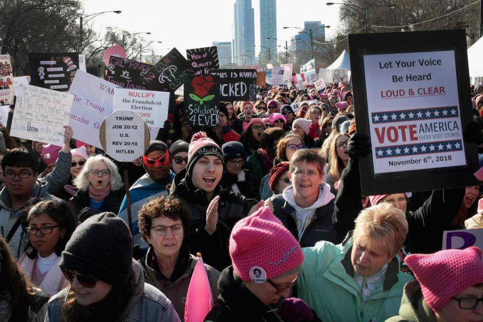 People rally downtown in Chicago, Illinois for the Women's March (Getty Images)