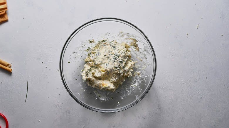 cheese ball ingredients mixed together in bowl