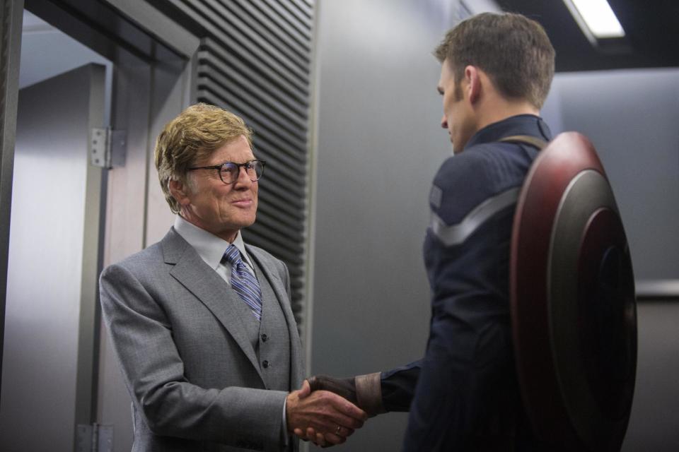 This image released by Marvel shows Robert Redford, left, and Chris Evans in a scene from "Captain America: The Winter Soldier." (AP Photo/Marvel-Disney)