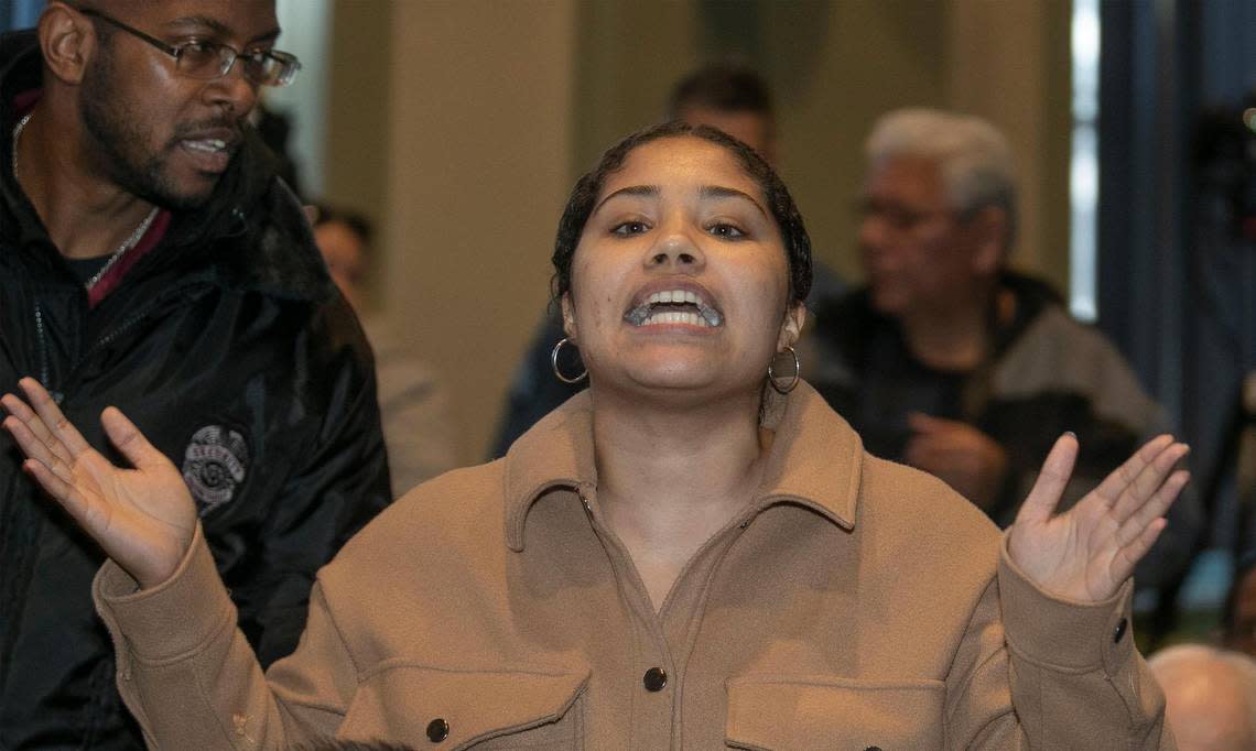 Amaia Cook of Decarcerate KC spoke out of turn and was escorted out by police during a public forum with the three KCPD Chief of Police finalists Saturday, December 10, 2022 at the Robert J. Mohart Multipurpose Center, 3200 Wayne Avenue, Kansas City, MO.  