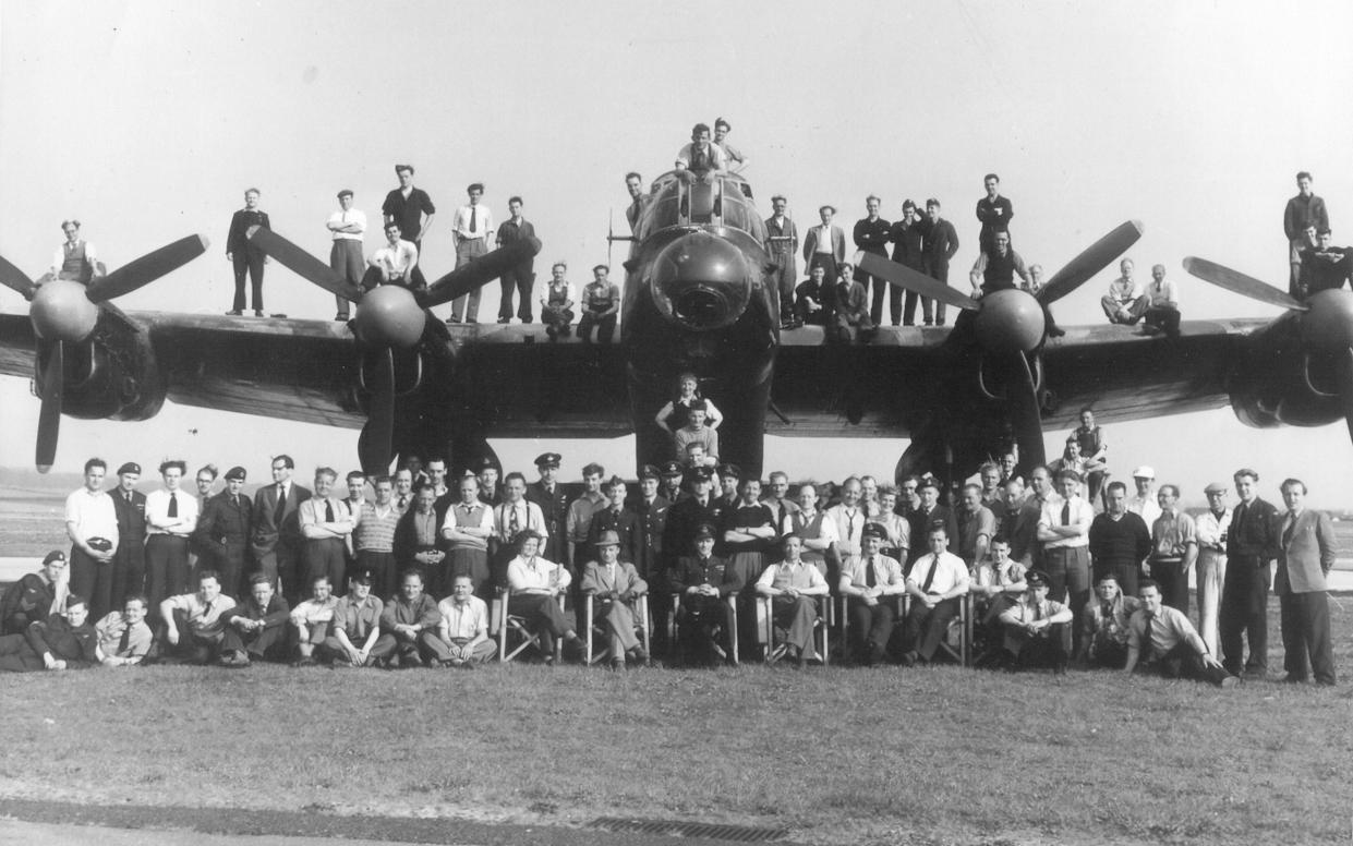 Richard Todd, front, centre, who played Guy Gibson, with the film crew and flight crews who worked on The Dam Busters