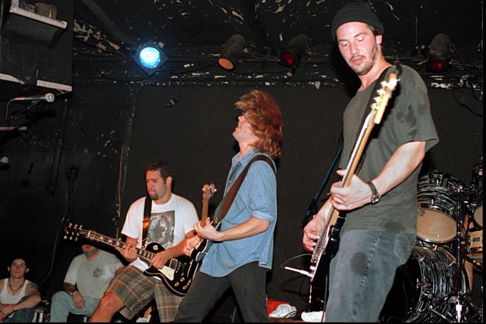 The band Dogstar, with bassist Keanu Reeves, performs at the 9:30 Club in Washington, D.C., on July 25, 1995. By the beginning of 1996, the venue had moved into a new, larger space to stay competitive in bringing the best bands to town.