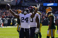 Chicago Bears running back Khalil Herbert (24) celebrates his touchdown during the first half of an NFL football game against the Green Bay Packers Sunday, Oct. 17, 2021, in Chicago. (AP Photo/Nam Y. Huh)