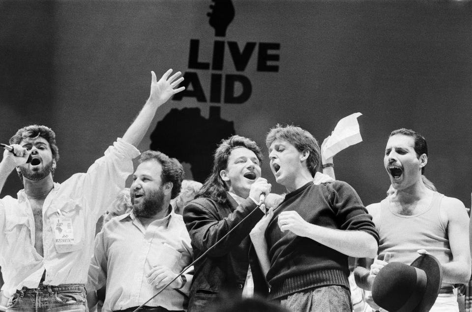 George Michael, promoter Harvey Goldsmith, Bono, Paul McCartney, and Freddie Mercury during the Live Aid finale in London. (Photo: Staff/Daily Mirror/Mirrorpix/Getty Images)