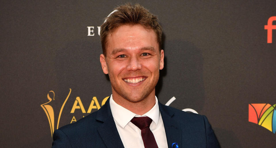 Home and Away actor Lincoln Lewis pictured at the 2018 AACTA Awards. A Melbourne woman allegedly used his image to prey on young women online.