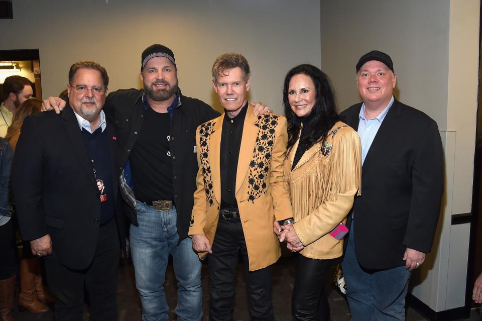 Conway Entertainment Group’s Tony Conway, Garth Brooks, Randy Travis, Mary Davis, and Kirt Webster backstage during 1 Night. 1 Place. 1 Time: A Heroes & Friends Tribute to Randy Travis in Nashville on Feb. 8. (Photo: Rick Diamond/Getty Images for Outback Concerts)