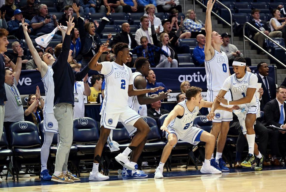 Brigham Young Cougars bench erupts after Brigham Young Cougars guard Jared McGregor (51) dropped in a three point shot as BYU and SE Louisiana play at the Marriott Center in Provo on Wednesday, Nov. 15, 2023. BYU won 105-48. | Scott G Winterton, Deseret News