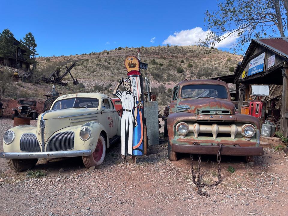 Two automobiles at the ghost town.