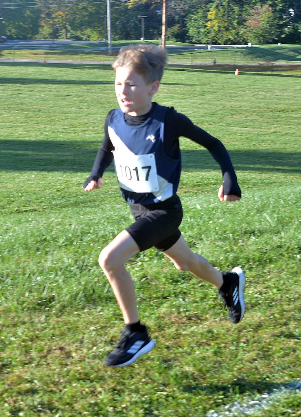 Boonsboro's Cruz Eissens runs to the finish to win the third-grade boys race during the 2022 WCPS Elementary School Cross Country run at Eastern Elementary in Hagerstown on Oct. 8.