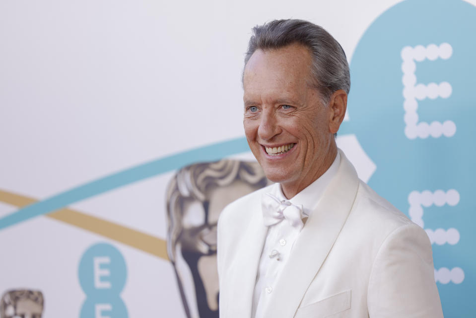 Richard E. Grant poses for photographers upon arrival at the 76th British Academy Film Awards, BAFTA's, in London, Sunday, Feb. 19, 2023. (Photo by Vianney Le Caer/Invision/AP)