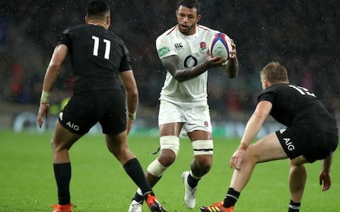 Courtney Lawes of England looks to pass the ball during the Quilter International match between England and New Zealand at Twickenham - Credit: Getty