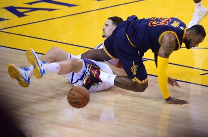 LeBron James' triple-double wasn't enough to save the Cavs from a second straight double-digit Finals defeat. (AFP) 