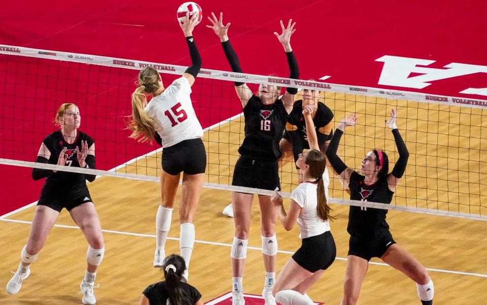 Nebraska Cornhuskers middle blocker Andi Jackson (15) attacks the ball against the Omaha Mavericks during the third set at Memorial Stadium