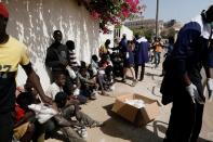 Food distribution to street children amid the coronavirus disease (COVID-19) outbreak in Dakar