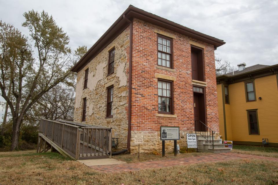 A view of the Ritchie House, 1116 SE Madison, shows the original exposed brick and rock exterior.