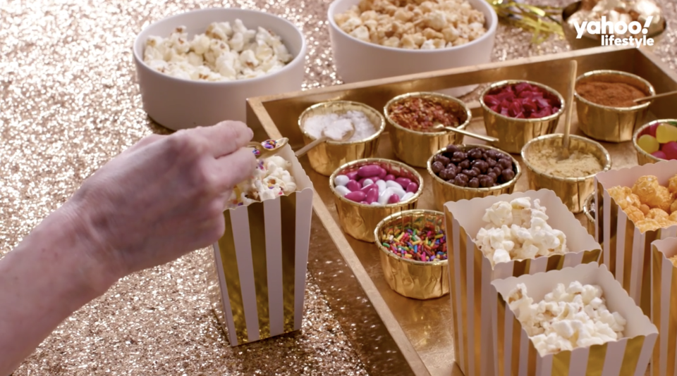 A DIY popcorn bar should be a must-have for any party, not just for the Oscars. (Photo: Yahoo Lifestyle)