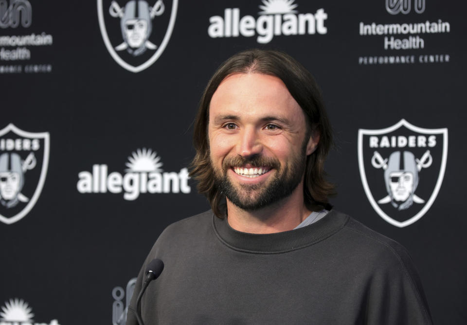 Las Vegas Raiders quarterback Gardner Minshew II smiles during an NFL football news conference, Thursday, March 14, 2024, in Henderson, Nev. (Steve Marcus/Las Vegas Sun via AP)