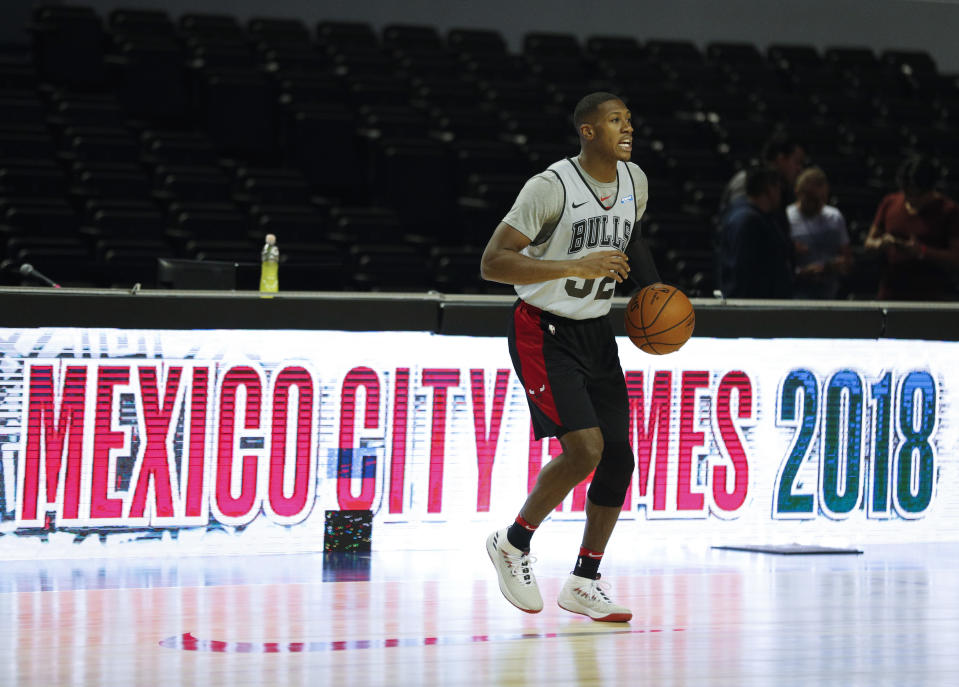 Chicago Bulls guard Kris Dunn dribbles the ball during basketball practice at the Mexico City Arena in Mexico City, Wednesday, Dec. 12, 2018. The Bulls will face Orlando Magic Thursday in the first of two 2018 regular-season NBA games to be played in the high-altitude Mexican capital. (AP Photo/Rebecca Blackwell)