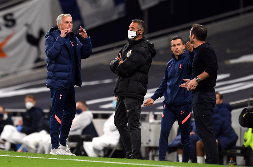 Tottenham manager Jose Mourinho (left) and his Chelsea counterpart Frank Lampard (right) got into an animated discussion during Tuesday's EFL Cup match between the teams. (Neil Hall/Getty Images)