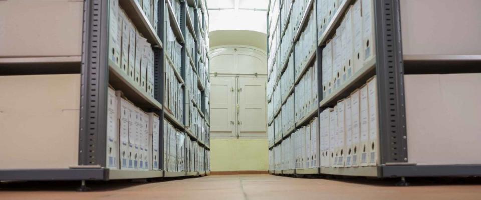 Historical archive warehouse full of carton boxes. Low angle shot