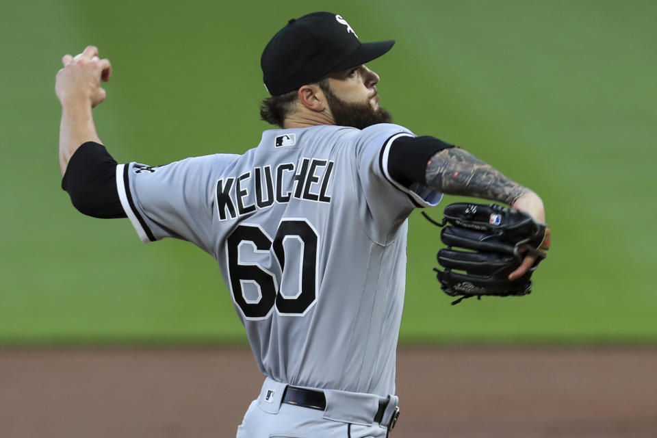 Chicago White Sox's Dallas Keuchel throws in the first inning during a baseball game against the Cincinnati Reds in Cincinnati, Saturday, Sept. 19, 2020. (AP Photo/Aaron Doster)