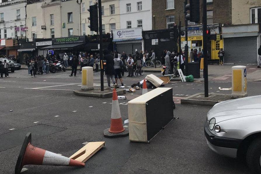 Protesters blocked the road with traffic cones and discarded rubbish. (Tom Connelly)