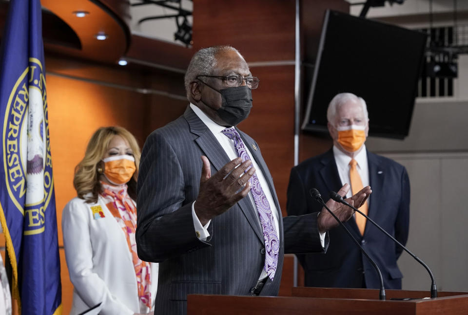 House Majority Whip James Clyburn, D-S.C., flanked by Rep. Lucy McBath, D-Ga., left, and Rep. Mike Thompson, D-Calif., chairman of the House Gun Violence Prevention Task Force, speaks a news conference on passage of gun violence prevention legislation, at the Capitol in Washington, Thursday, March 11, 2021. (AP Photo/J. Scott Applewhite)