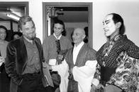 FILE - Composer-lyricist Stephen Sondheim, left, is shown with cast members of "Pacific Overtures" after the closing performance of the revival musical at New York's Church of the Heavenly Rest at York Theater, Sunday, April 14, 1984. The actors are, from left, Kevin Gray, Ernest Ababa, and Tony Marino. Sondheim, the songwriter who reshaped the American musical theater in the second half of the 20th century, has died at age 91. Sondheim's death was announced by his Texas-based attorney, Rick Pappas, who told The New York Times the composer died Friday, Nov. 26, 2021, at his home in Roxbury, Conn. (AP Photo, File)