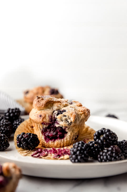 <p>The Food Cafe</p><p>Breakfast becomes heaven when biting into a homemade blackberry muffin filled with fresh, juicy blackberries from start to finish.</p><p><strong>Get the recipe: <a href="https://thefoodcafe.com/bakery-style-blackberry-muffins/" rel="nofollow noopener" target="_blank" data-ylk="slk:Bakery-Style Blackberry Muffins;elm:context_link;itc:0;sec:content-canvas" class="link ">Bakery-Style Blackberry Muffins</a></strong></p>