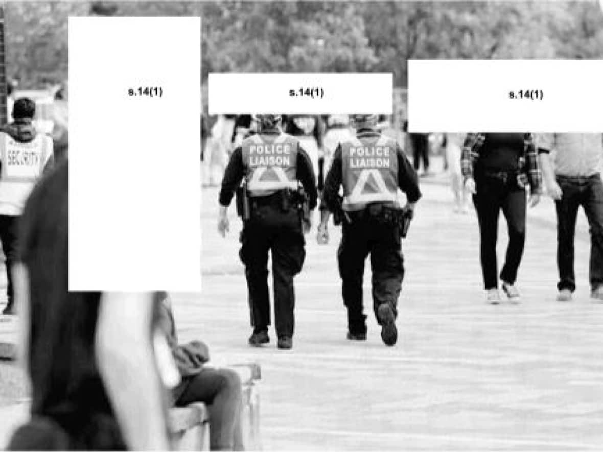 A partly redacted police image obtained through an access to information request shows officers on duty during Panda Game celebrations in October.  (Ottawa Police Service - image credit)