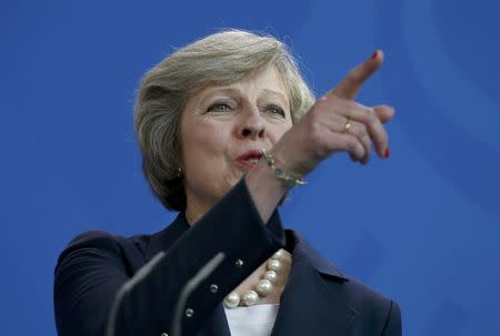 British Prime Minister Theresa May addresses a news conference following talks with German Chancellor Angela Merkel at the Chancellery in Berlin, Germany July 20, 2016. REUTERS/Hannibal Hanschke