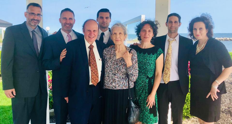 Richard and Rose-Marie Dujardin, center, are seen with their six children in an undated family photo. Richard Dujardin of Providence, Rhode Island, died in a fall as the Kilbourn Avenue Bridge was opening on Monday.