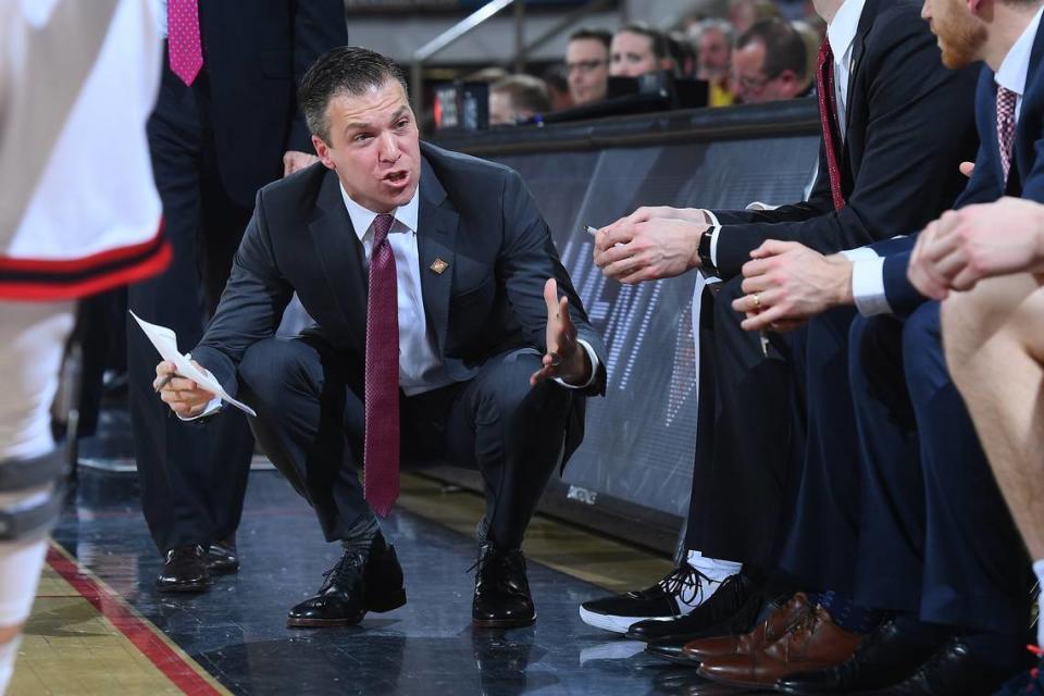 Davidson associate head coach Matt McKillop yells down the Wildcat bench early in the second half of the 2019 NIT first round against Lipscomb at Belk Arena on Tuesday, March 19, 2019 in Davidson, North Carolina. Davidson lost 89-81.