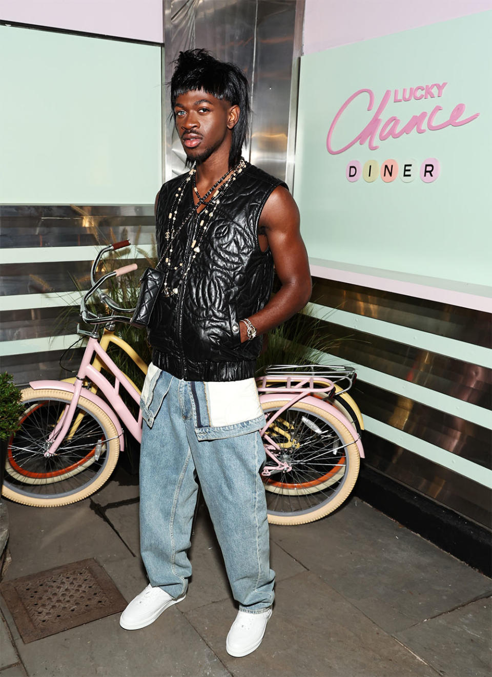 Lil Nas X, wearing CHANEL, attends the CHANEL party to celebrate the debut of the Lucky Chance Diner on September 06, 2023 in Brooklyn, New York.