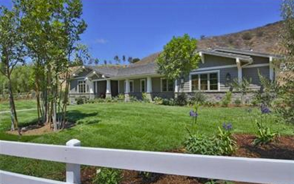 <p>Jenner’s new home, which was built in a Craftsman-style in 2012, boasts 5,147 square feet and is right next to the six-bedroom, 6.5 bathroom and 7,040 square-foot home she bought in May. Both sit on undeveloped land, with views of the surrounding hillsides and plenty of potential for upgrades. (Trulia.com) </p>