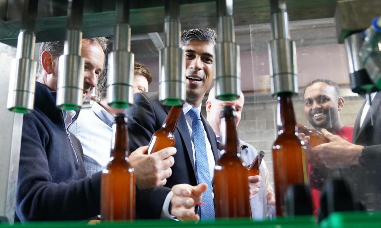 <span>The prime minister watches beer being bottled at the Vale of Glamorgan Brewery in Barry, south Wales on Thursday 23 May. He seemed unaware that Wales hadn’t qualified for the Euros.</span><span>Photograph: Stefan Rousseau/PA</span>