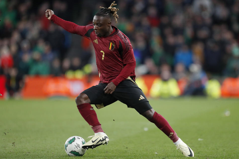 FILE - Belgium's Jeremy Doku controls the ball during the international friendly soccer match between Ireland and Belgium in Dublin, Ireland, Saturday, March 23, 2024. (AP Photo/Peter Morrison, File)