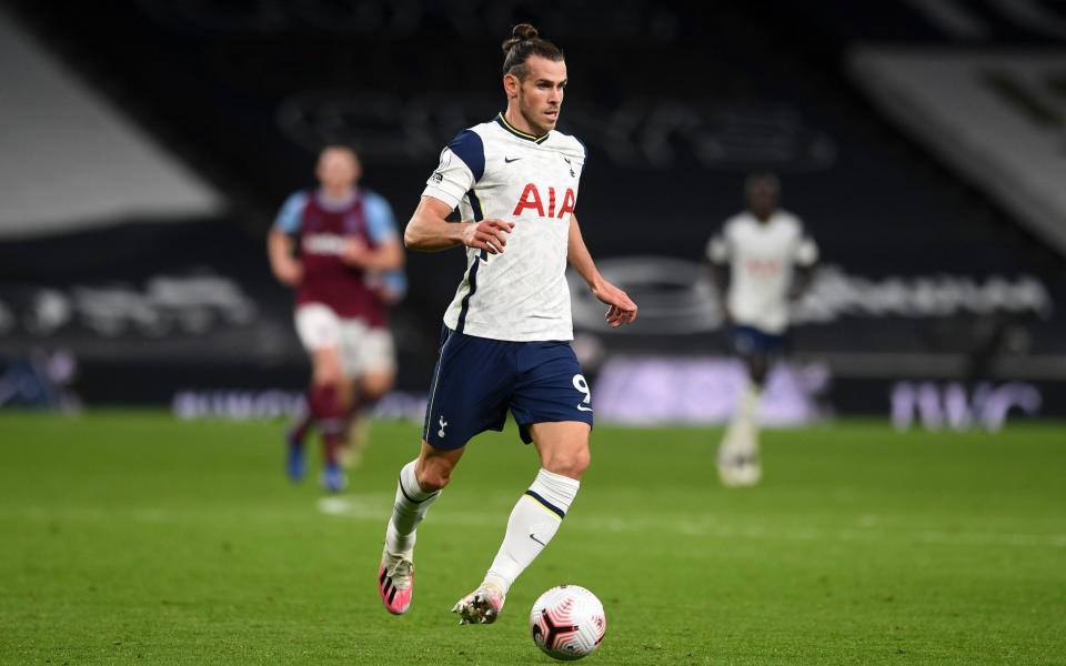 Gareth Bale of Tottenham Hotspur runs with the ball during the Premier League match between Tottenham Hotspur and West Ham United at Tottenham Hotspur Stadium on October 18, 2020 in London, England. - GETTY IMAGES