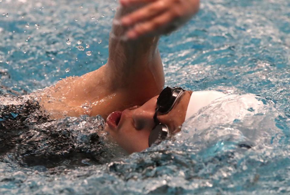 Ambar Ortega Armendariz of Del Valle High School wins the second heat of the women’s 100-meter backstroke in the District 2-5A Championship meet, Jan. 24, 2024.