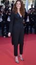<p> Following up with her love for suits, the star still incorporates this beloved wardrobe staple into her style whenever she can. She wore this stunning black pantsuit to Cannes in 2022, which featured a fun navy blue lapel that added some contrast to the elegant suit. </p>