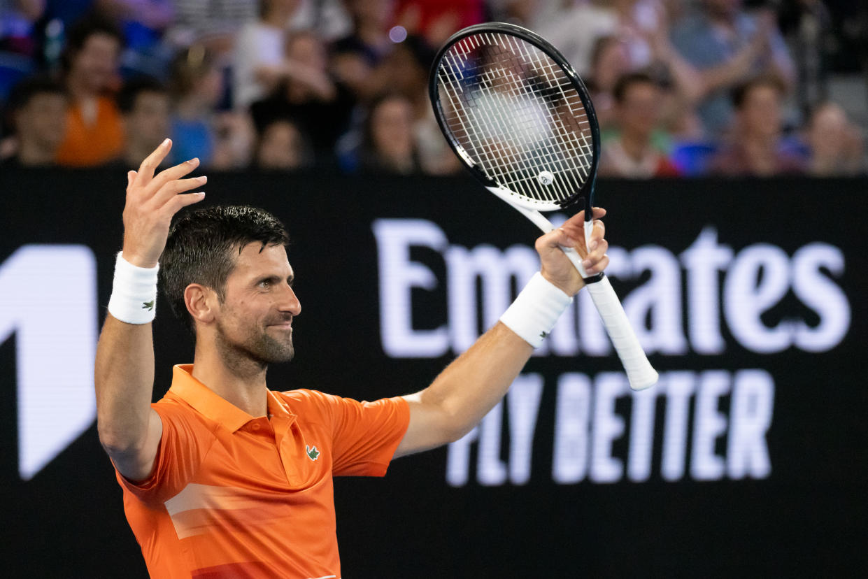 MELBOURNE, AUSTRALIA - JANUARY 13: Novak Djokovic of Serbia celebrates a point against Nick Kyrgios of Australia in an Arena Showdown charity match ahead of the 2023 Australian Open at Melbourne Park on January 13, 2023 in Melbourne, Australia. (Photo credit should read Chris Putnam/Future Publishing via Getty Images)