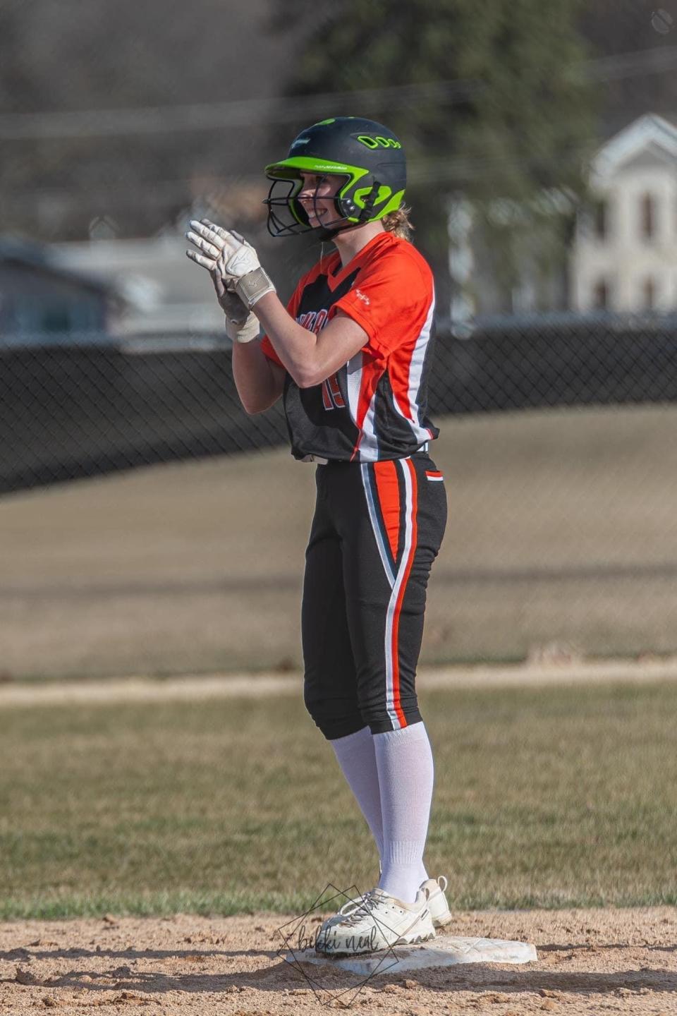 Winnebago freshman Vanessa Warkentien claps after a hit during a recent softball game this season.