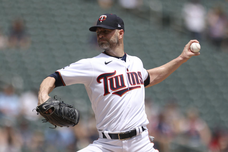 Minnesota Twins' pitcher J.A. Happ throws against the Cleveland Indians during the first inning of a baseball game, Sunday, June 27, 2021, in Minneapolis. (AP Photo/Stacy Bengs)