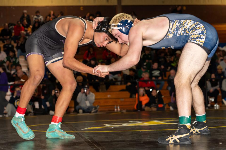 Colonia’s Michael Feliciano beats Monroe Township’s Omar Cholula in the 175 lb. weight class in the GMC Tournament Final on Jan. 27, 2024 afternoon at the Piscataway High School gymnasium in Piscataway.