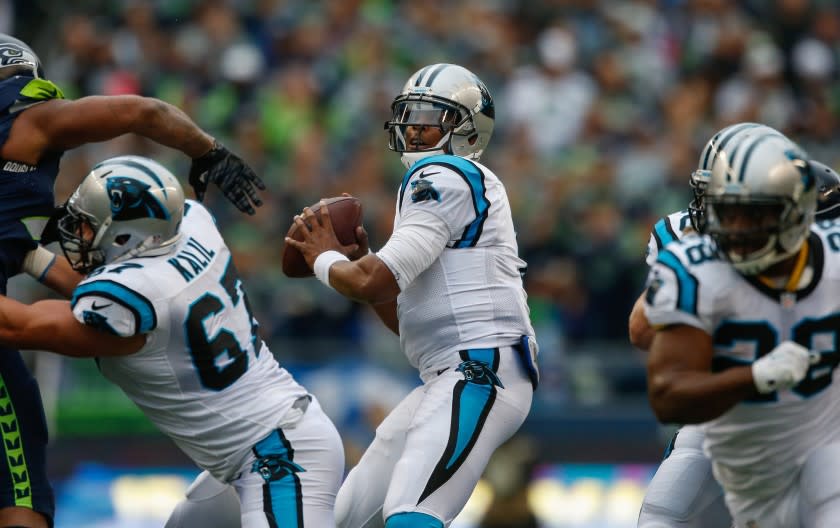 Panthers quarterback Cam Newton passes against the Seahawks during a game on Oct. 18.