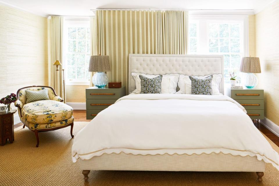 Neutral Primary Bedroom with Drapery Covered Wall