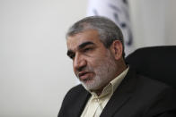 In this Nov. 9, 2019, photo, Abbas Ali Kadkhodaei, a prominent member of Iran's powerful Guardian Council, speaks in an interview with The Associated Press, in Tehran, Iran. A prominent member of Iran’s powerful Guardian Council has told The Associated Press that the Islamic Republic should stop honoring the terms of its collapsing 2015 nuclear deal with world powers amid tensions with the U.S. (AP Photo/Vahid Salemi)