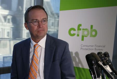 Office of Management and Budget (OMB) Director Mick Mulvaney arrives to speak to the media at the U.S. Consumer Financial Protection Bureau (CFPB), where he began work earlier in the day after being named acting director by U.S. President Donald Trump in Washington November 27, 2017. REUTERS/Joshua Roberts