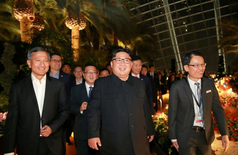 Kim Jong Un was accompanied by Singapore's foreign minister as he went on a waterfront stroll