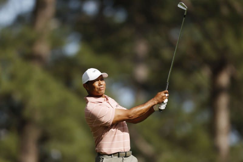 Tiger Woods tees off on the fourth hole during the first round of the Masters Tournament on Thursday at Augusta National Golf Club in Augusta, Ga. Photo by John Angelillo/UPI